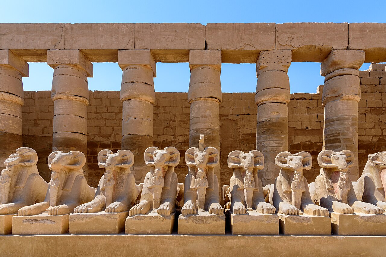 Ram-headed sphinxes and columns at the Karnak temple complex in Egypt